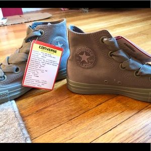 Army green Converse high tops